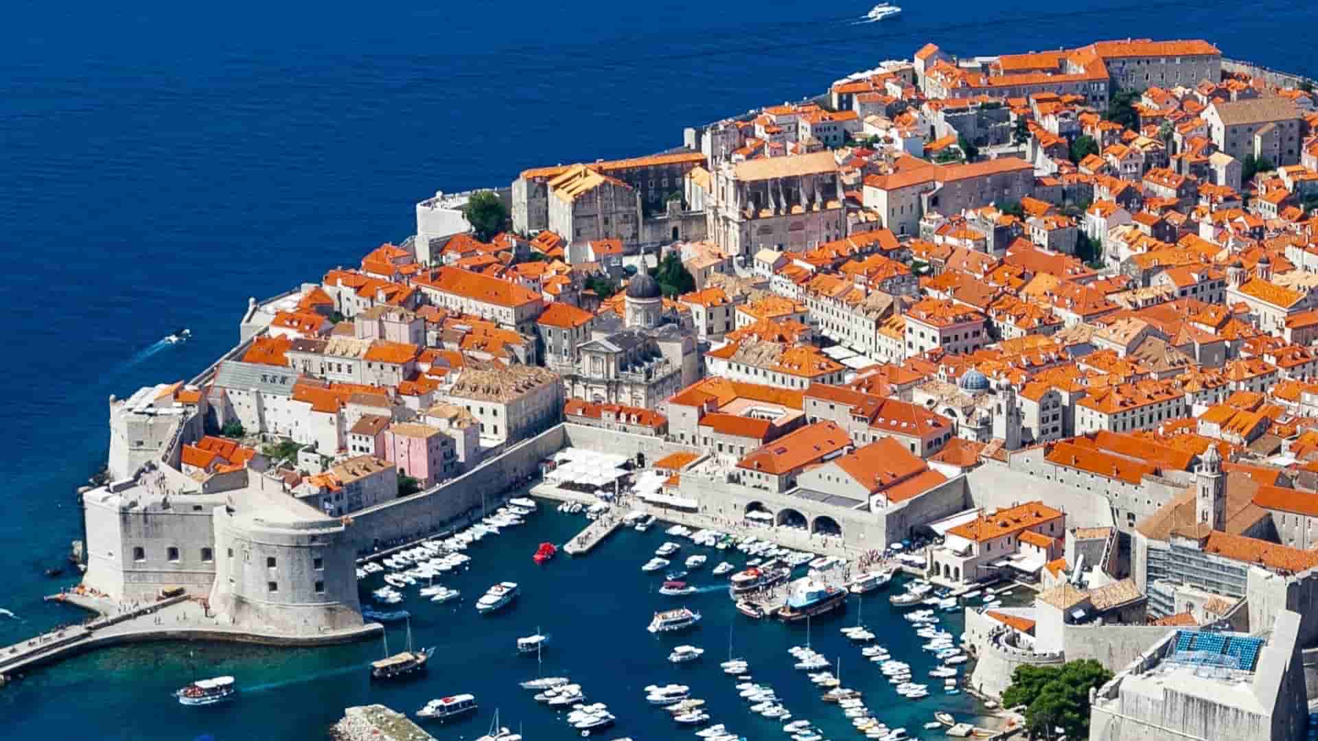aerial view of Dubrovnik in Croatia, city walls, port and sea