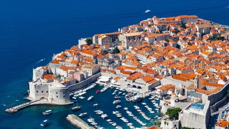 aerial view of Dubrovnik in Croatia, city walls, port and sea