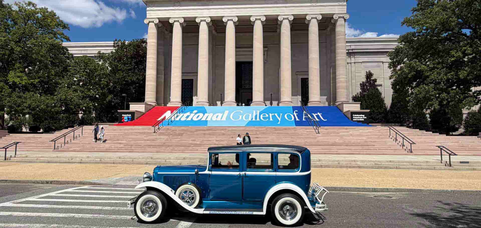 Vintage car passing in front of the main entrance of Washington DC National Art Gallery