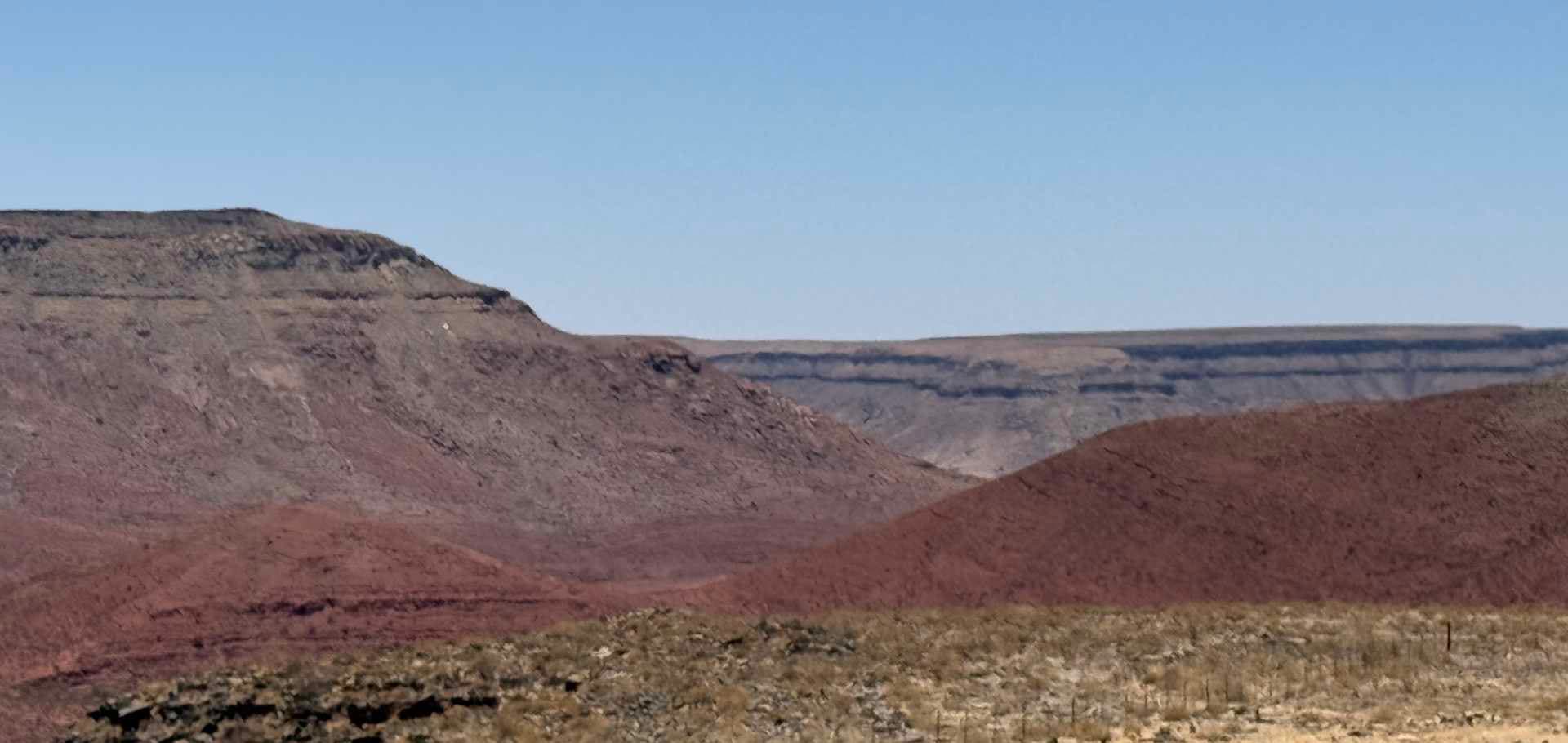 Expansive view over the deep, rugged canyon walls of the Fish River Canyon in Namibia