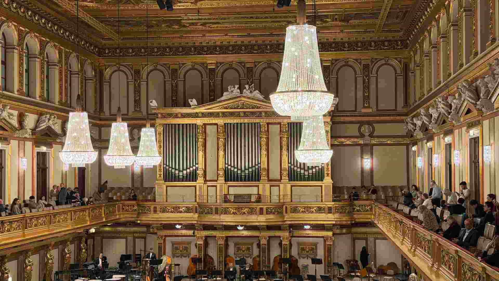 Gilded balconies and crystal chandeliers fill the magnificent interior of the Vienna Musikverein.