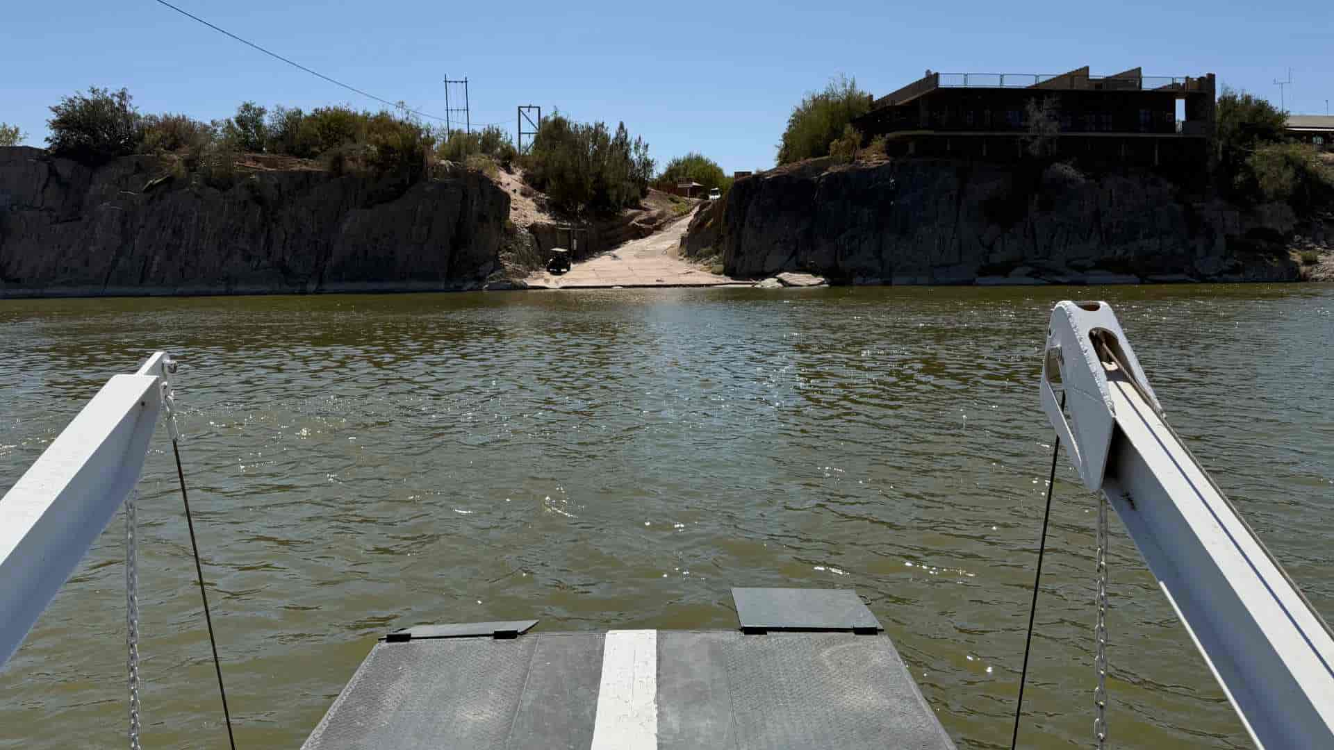 Approaching the concrete slipway on the opposite bank from the river pontoon deck.