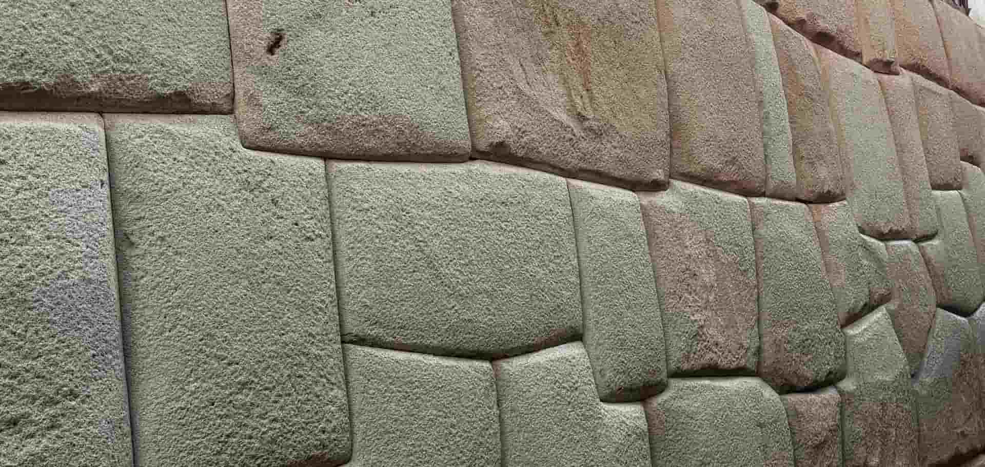 Close-up of precisely fitted mortarless Inca stonework at Sacsayhuamán.