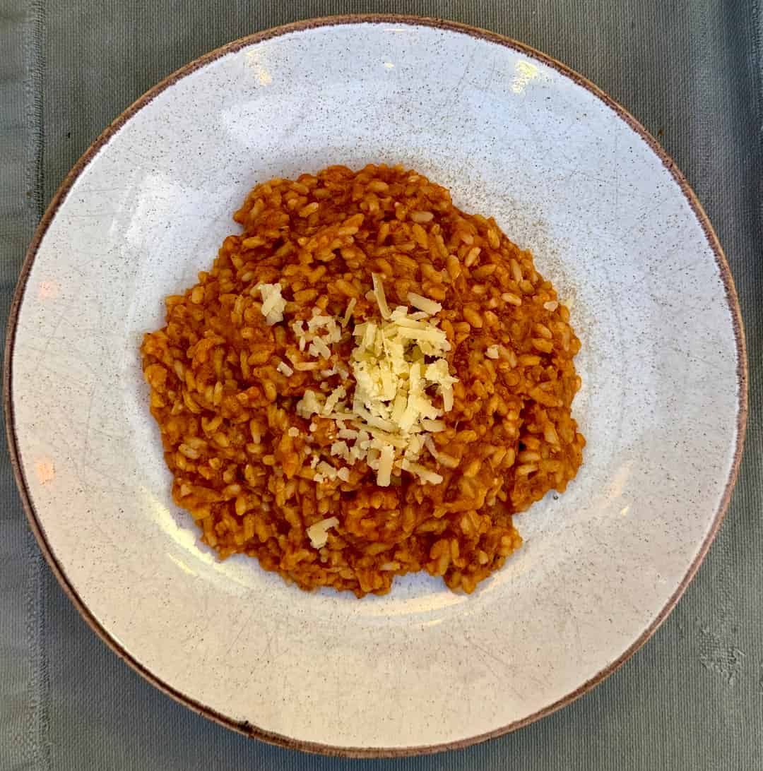 Skradin risotto with grated pecorino cheese on top