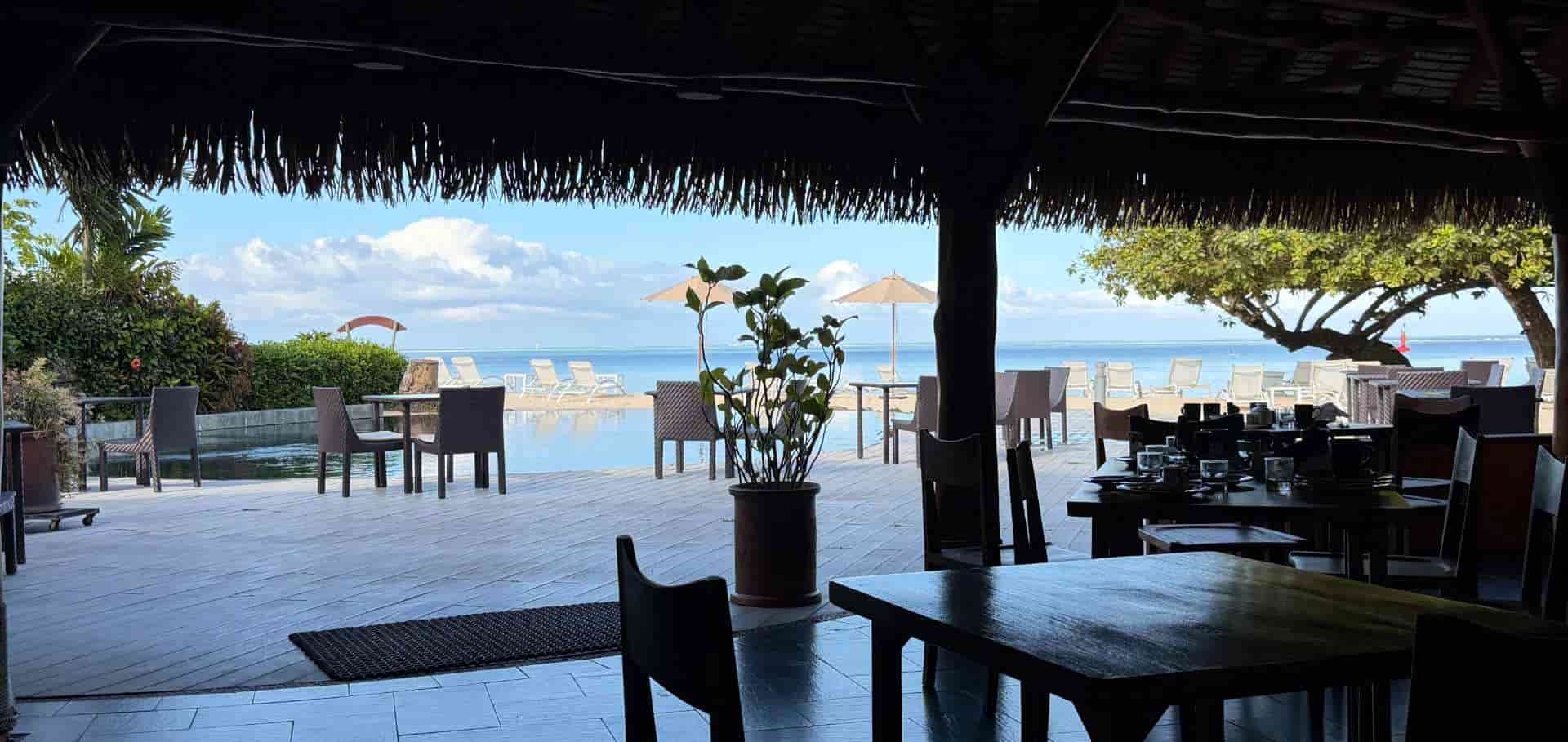 Outdoor dining terrace overlooking the ocean view at Maitai Lapita Village.