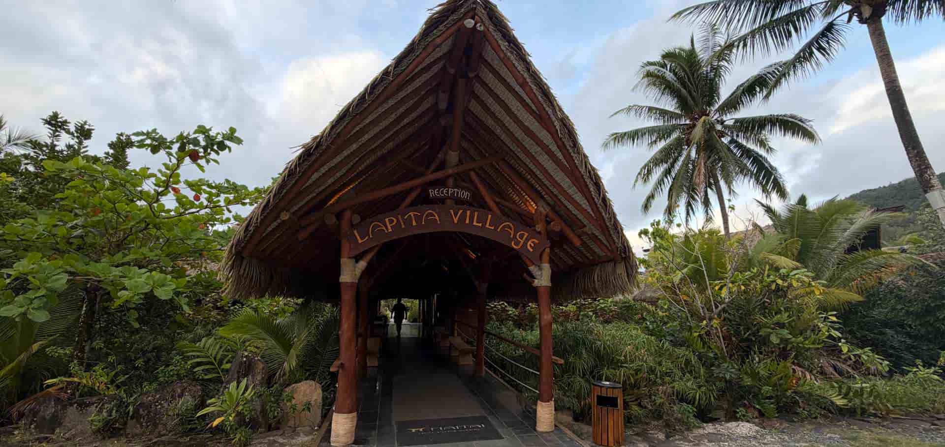 Thatched roof entrance pavilion at Maitai Lapita Village in Huahine.